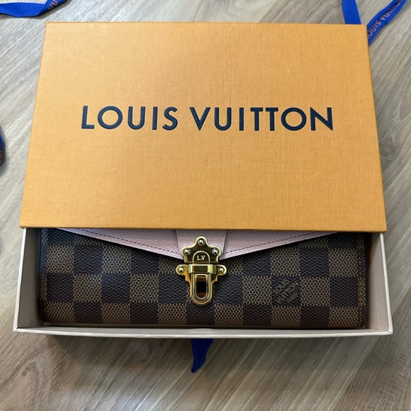 Authentic LOUIS VUITTON
Damier Ebene Clapton Wallet Magnolia - Picture 7 of 7